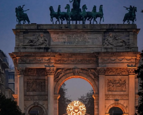 The Olympic cauldron at Milan’s Arco della Pace (Peace Arch)